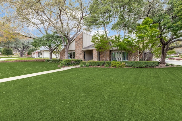 view of front of home with a front lawn