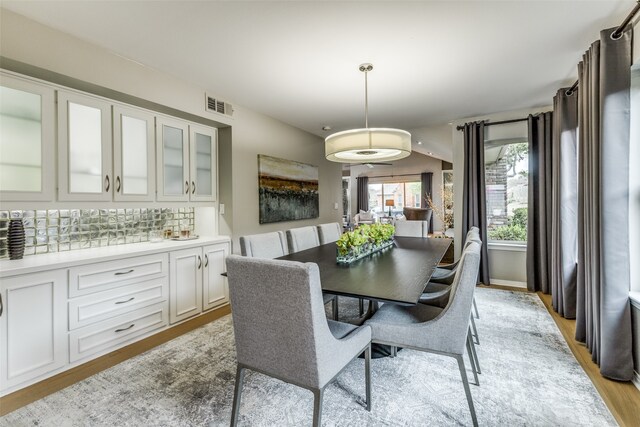 dining room with light wood-type flooring