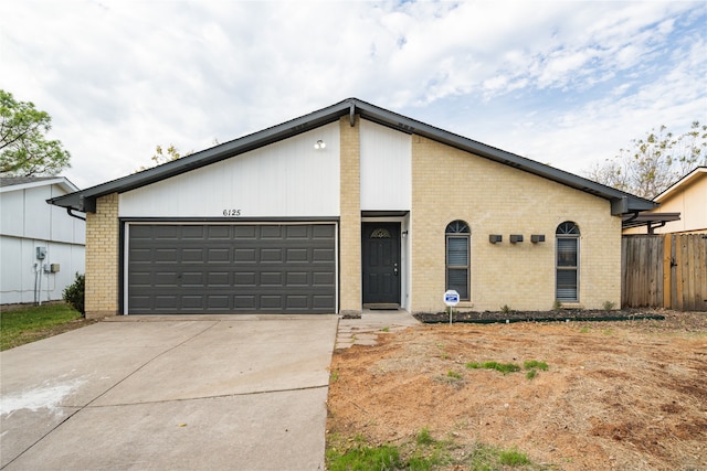 single story home with a garage