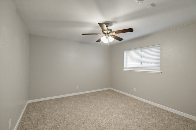 spare room featuring carpet floors