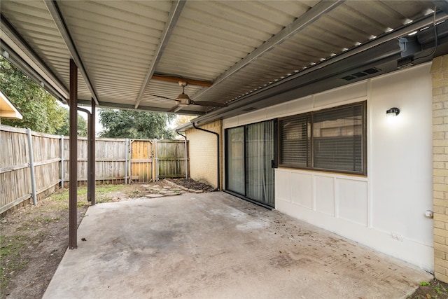 view of patio featuring ceiling fan