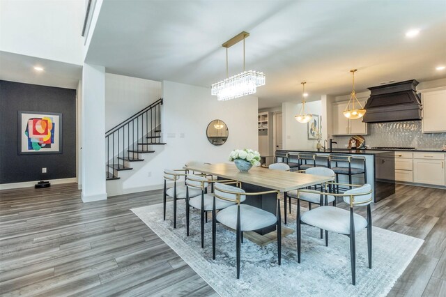 dining area featuring light wood-type flooring