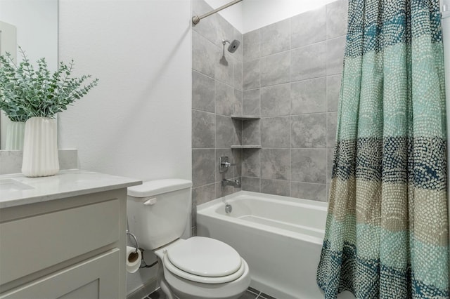 full bathroom featuring shower / tub combo with curtain, vanity, and toilet