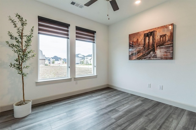 unfurnished room with wood-type flooring and ceiling fan