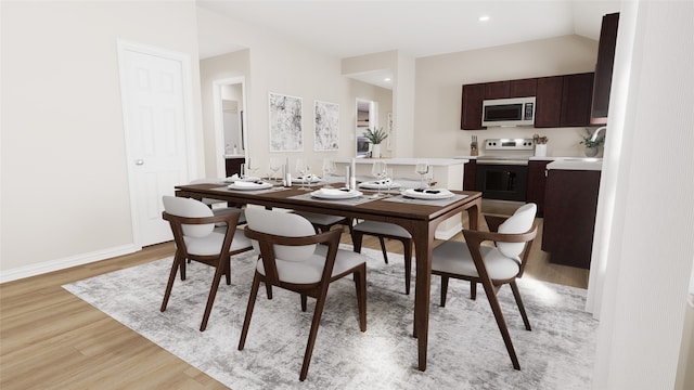 dining area with light hardwood / wood-style flooring