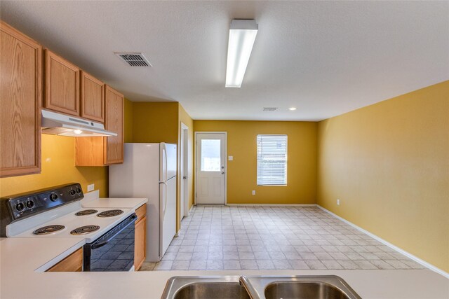 kitchen featuring white appliances