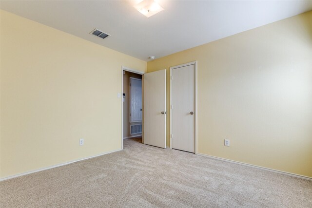 1303 Caroline Dr, Princeton, TX 75407 - empty room with light carpet and a smoke detector