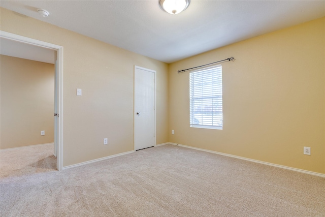 empty room with light carpet