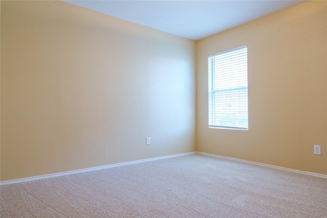 1303 Caroline Dr, Princeton, TX 75407 - spare room featuring carpet and baseboards