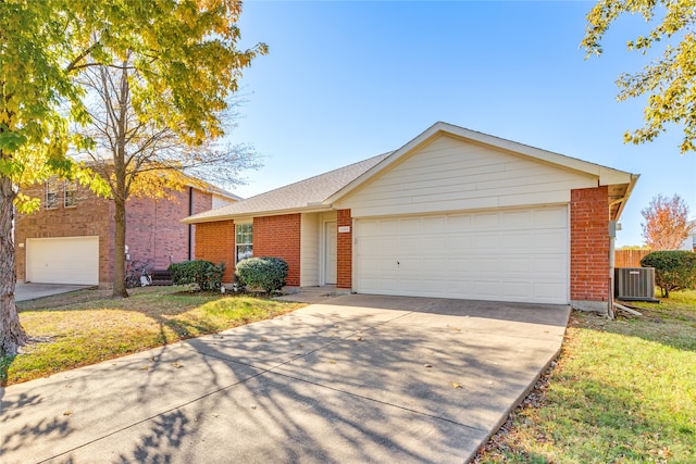 ranch-style home featuring central AC unit and a front lawn