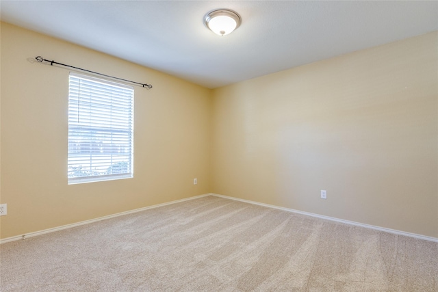 spare room with carpet flooring