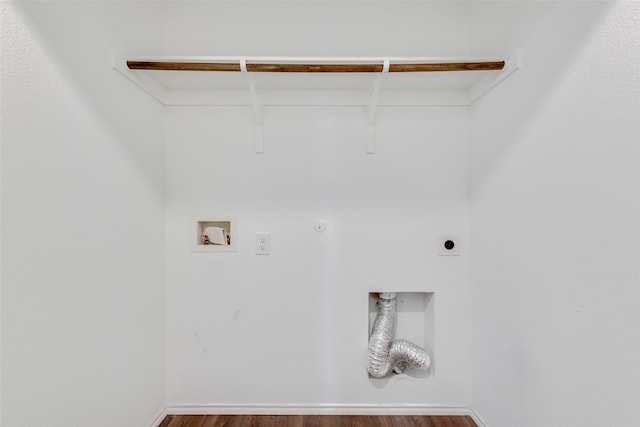 clothes washing area with electric dryer hookup, hookup for a washing machine, hookup for a gas dryer, and hardwood / wood-style floors