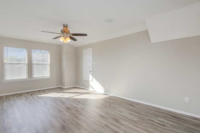 spare room featuring ceiling fan and light wood-type flooring