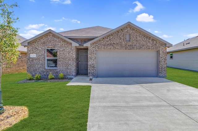 single story home featuring a front lawn and a garage