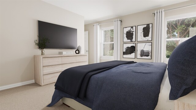 bedroom with carpet and multiple windows