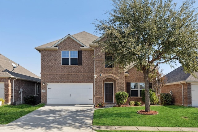 front facade with a garage and a front lawn