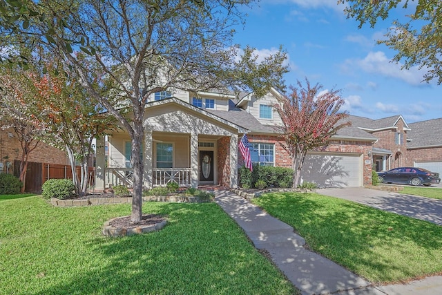 view of front facade featuring a porch, a garage, and a front lawn