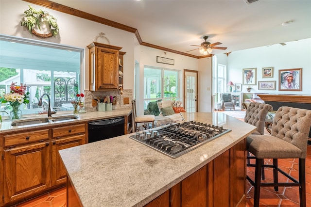 kitchen with tasteful backsplash, ceiling fan, sink, dishwasher, and stainless steel gas stovetop