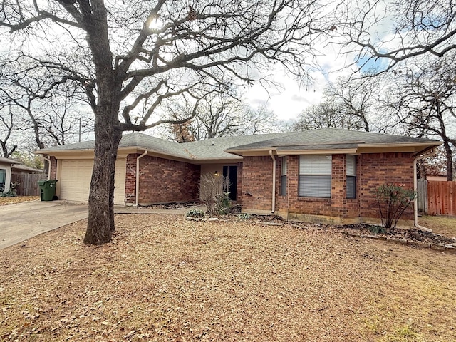 single story home featuring a garage