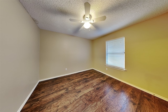 spare room featuring a textured ceiling, hardwood / wood-style flooring, and ceiling fan