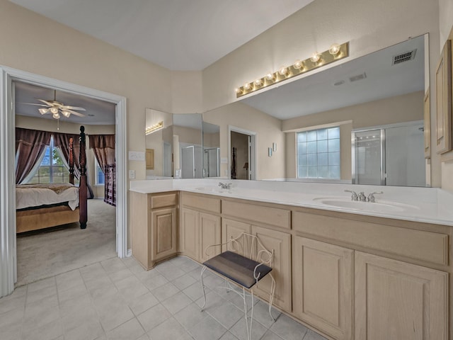 bathroom featuring double vanity, a stall shower, visible vents, ensuite bath, and a sink