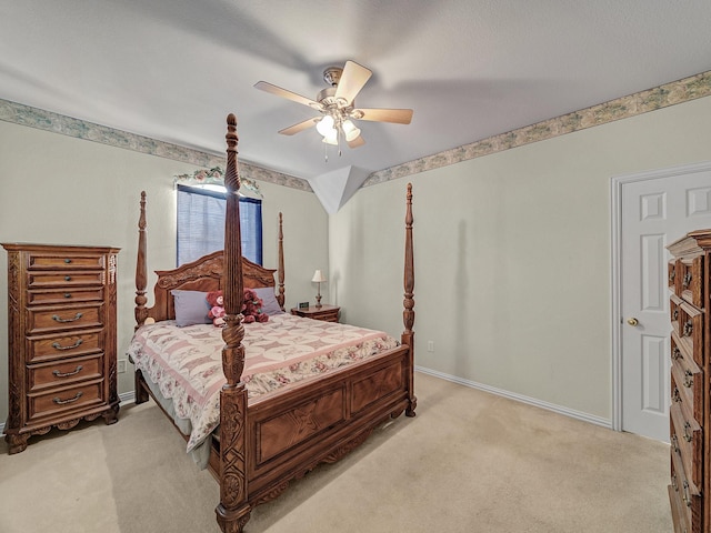 bedroom with light carpet, a ceiling fan, and baseboards