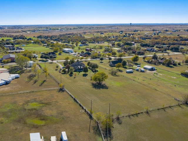 birds eye view of property featuring a rural view