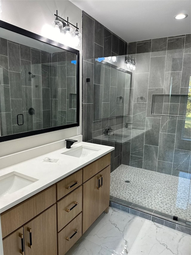 bathroom with vanity and an enclosed shower