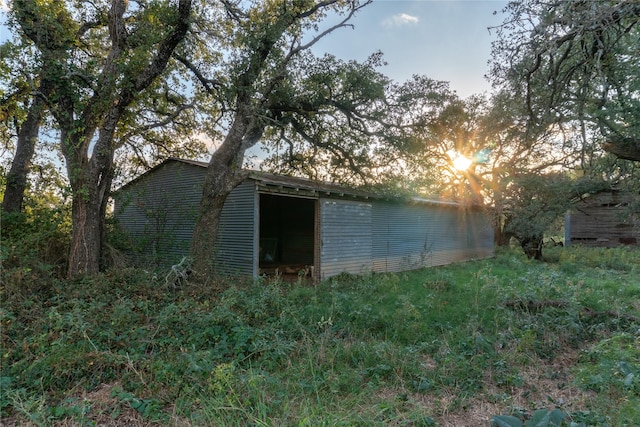 view of outdoor structure at dusk