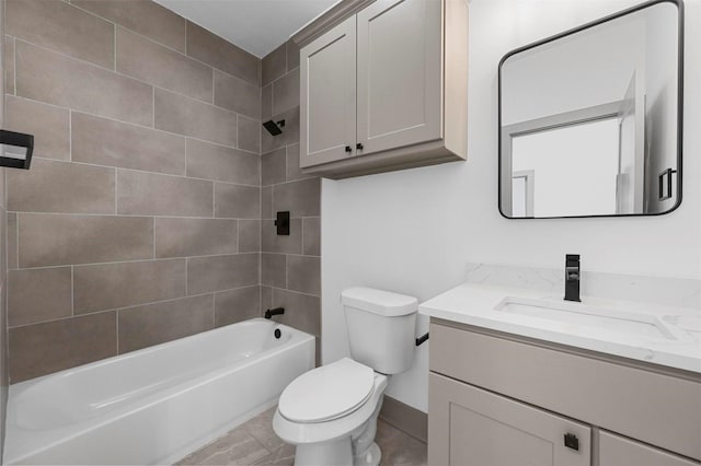 full bathroom with toilet, vanity, and tiled shower / bath combo