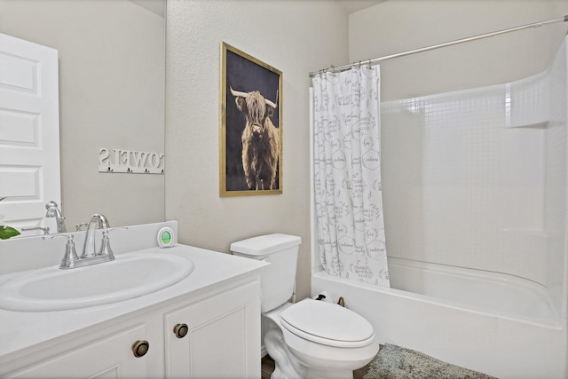 full bathroom with shower / bath combo, vanity, and toilet