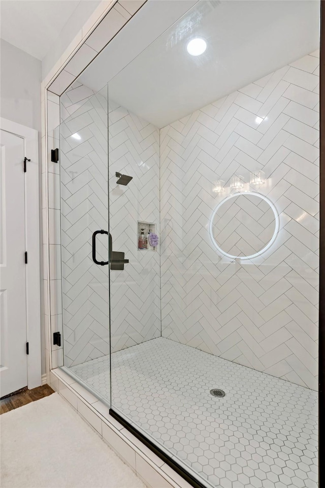 bathroom with an enclosed shower