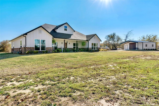 view of front of property featuring a garage and a front yard