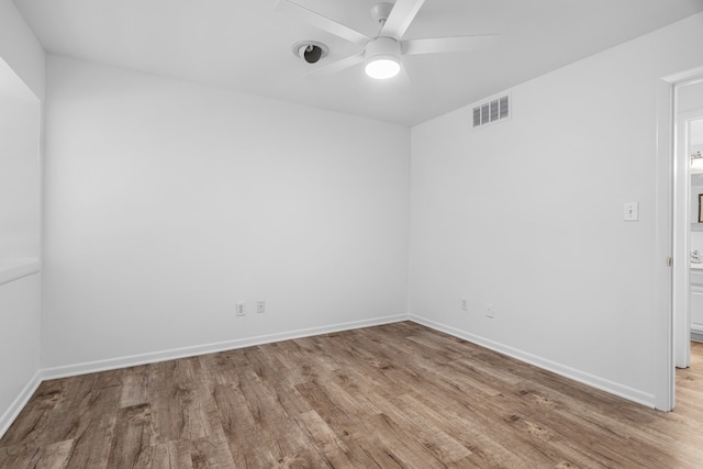 unfurnished room featuring ceiling fan and light hardwood / wood-style floors