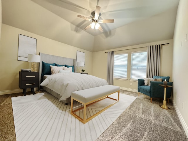 carpeted bedroom featuring ceiling fan and vaulted ceiling