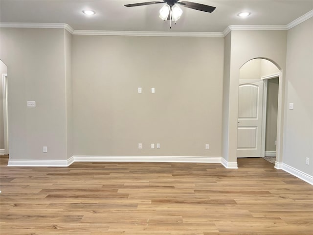 unfurnished room featuring crown molding, ceiling fan, and light hardwood / wood-style floors