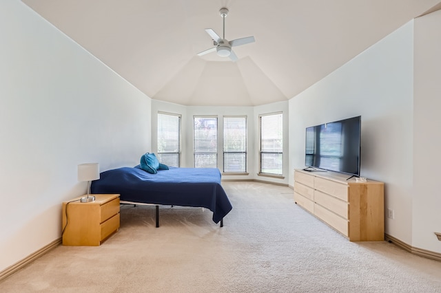 bedroom featuring ceiling fan, light colored carpet, and high vaulted ceiling