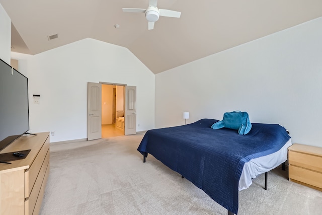 bedroom featuring light colored carpet, high vaulted ceiling, ceiling fan, and ensuite bathroom