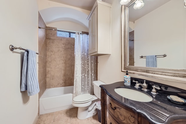 full bathroom featuring tile patterned flooring, shower / tub combo, vanity, and toilet