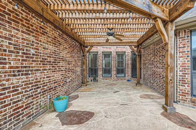 view of patio featuring a pergola and ceiling fan