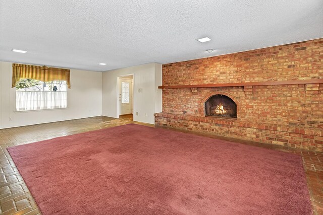 foyer with a textured ceiling