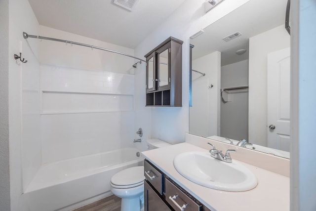 full bathroom featuring shower / bath combination, vanity, toilet, and wood-type flooring