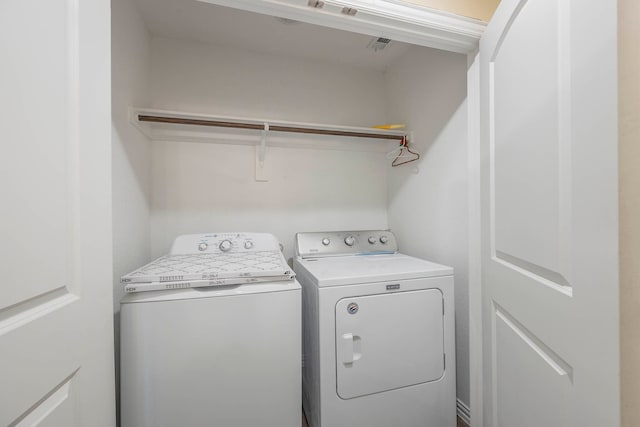 laundry area featuring washer and dryer