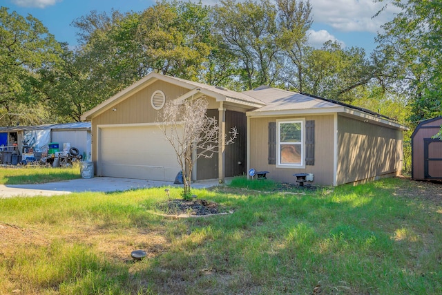 ranch-style house with a garage and a storage shed