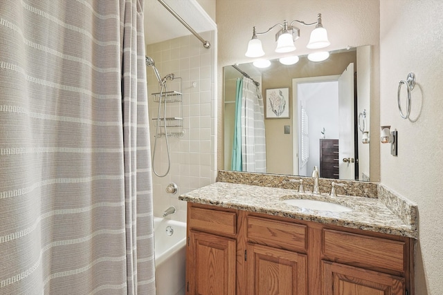 bathroom with vanity and shower / bath combo with shower curtain