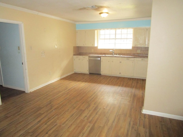 kitchen with sink, dishwasher, backsplash, crown molding, and light wood-type flooring