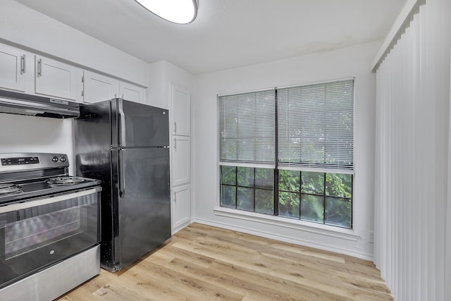 kitchen with white cabinets, light wood-type flooring, black refrigerator, and stainless steel range with electric cooktop