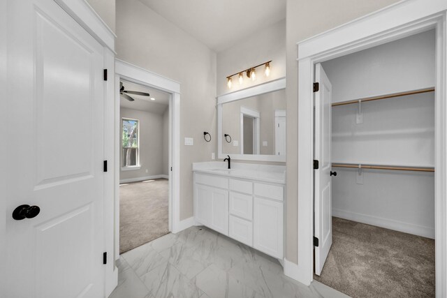 bathroom with vanity and ceiling fan