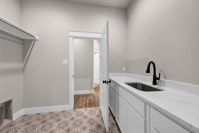 laundry room featuring sink