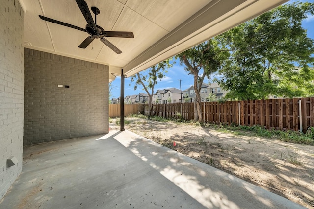 view of patio featuring ceiling fan